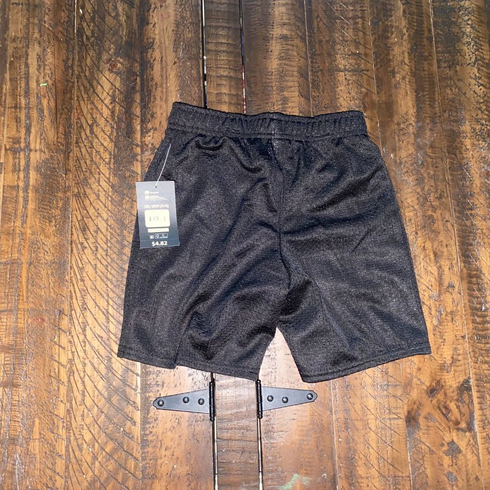 Never Worn black athletic shorts Size 4/5